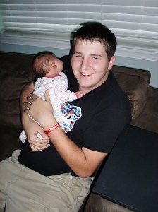 Cousin Wes had never held such a small baby, but did a great job!